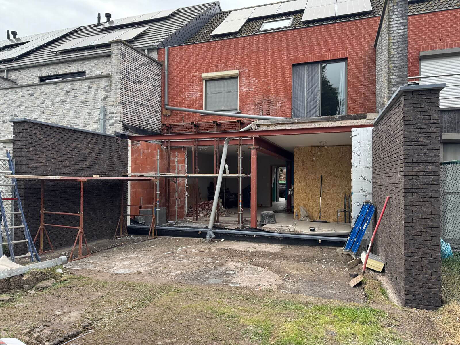 afwerking bijbouw gelijkvloers appartement aan huis